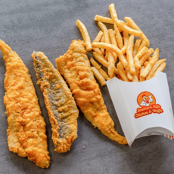 Three pieces of fried fish and a container of fries from Southern Style Chicken & Waffle.